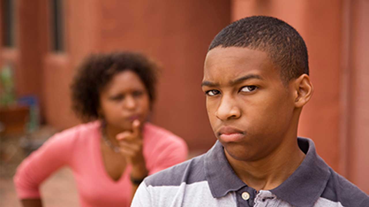 Mom disciplining teen